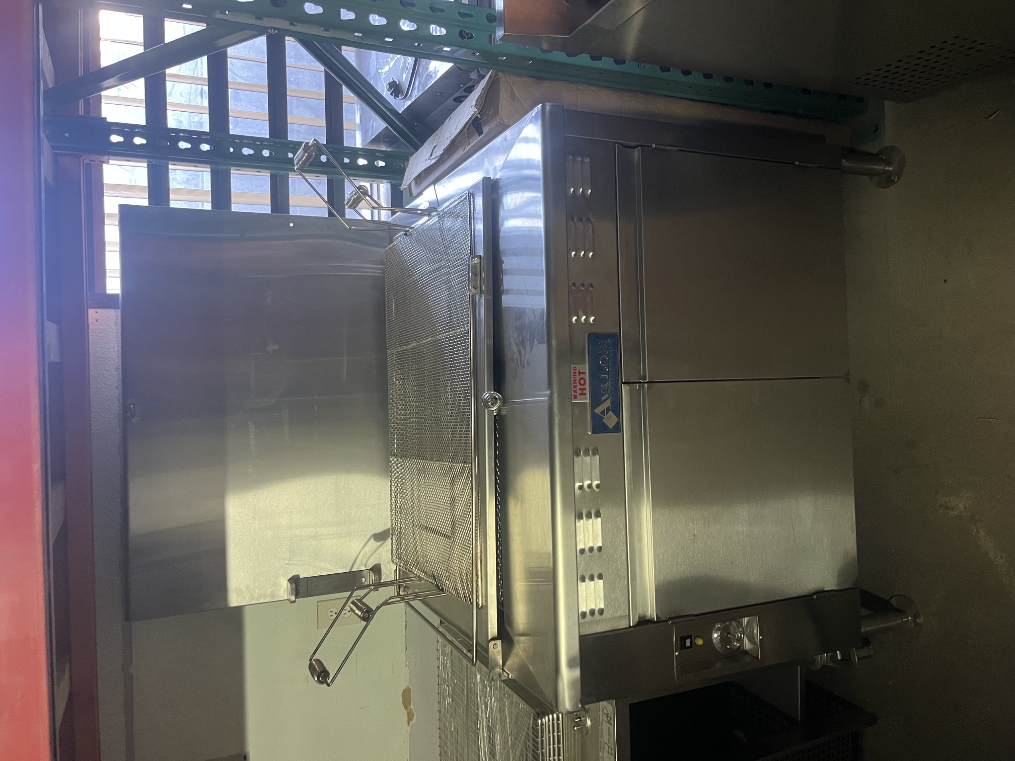 Avalon ADF34G-BA gas donut fryer front view showing stainless steel body, fry screens, and submerger arms