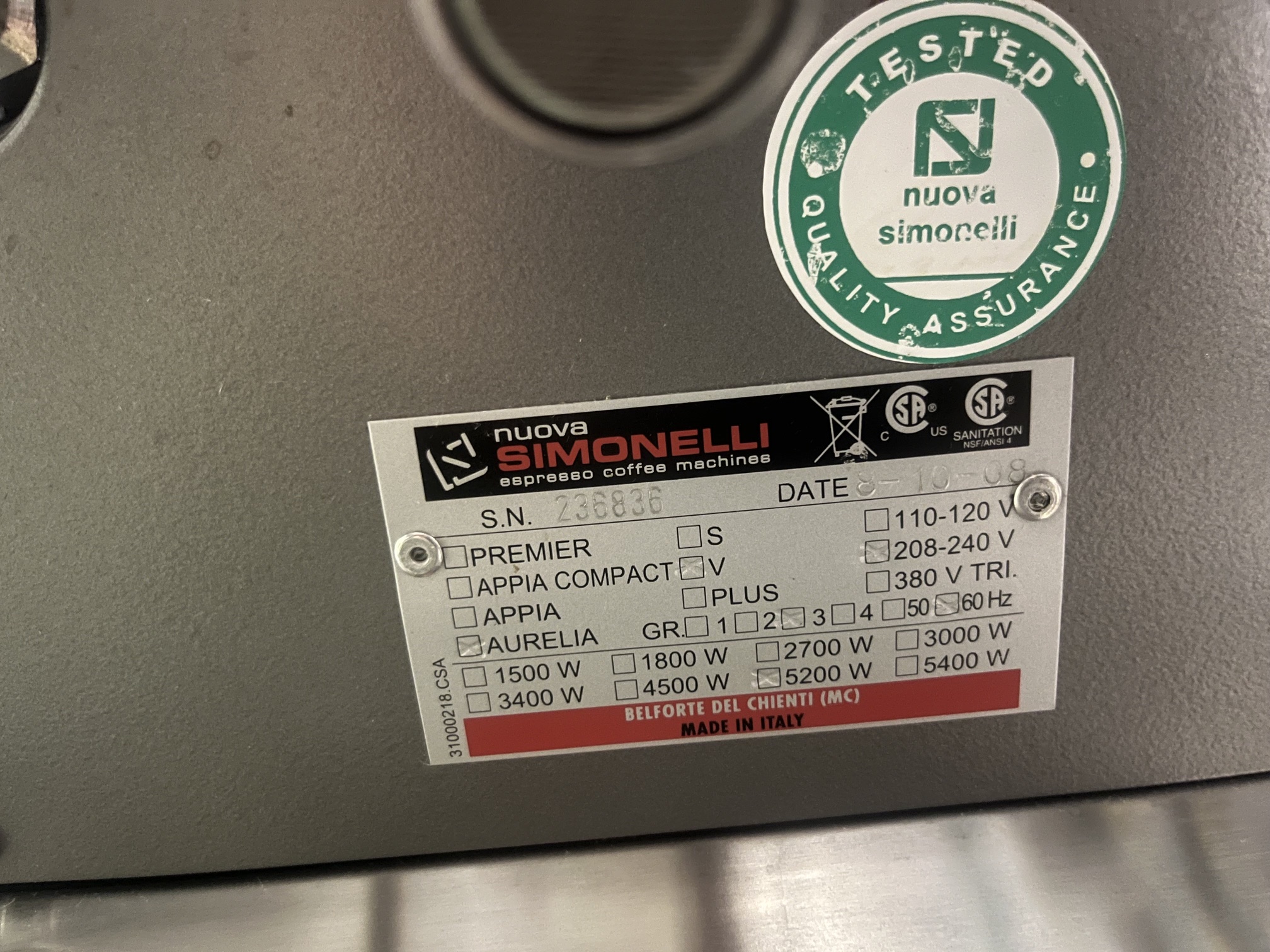 Data plate on Nuova Simonelli Aurelia V showing model Aurelia, GR 3, 208-240V, 60Hz, 5200W, serial number 236836, manufactured 8-10-08