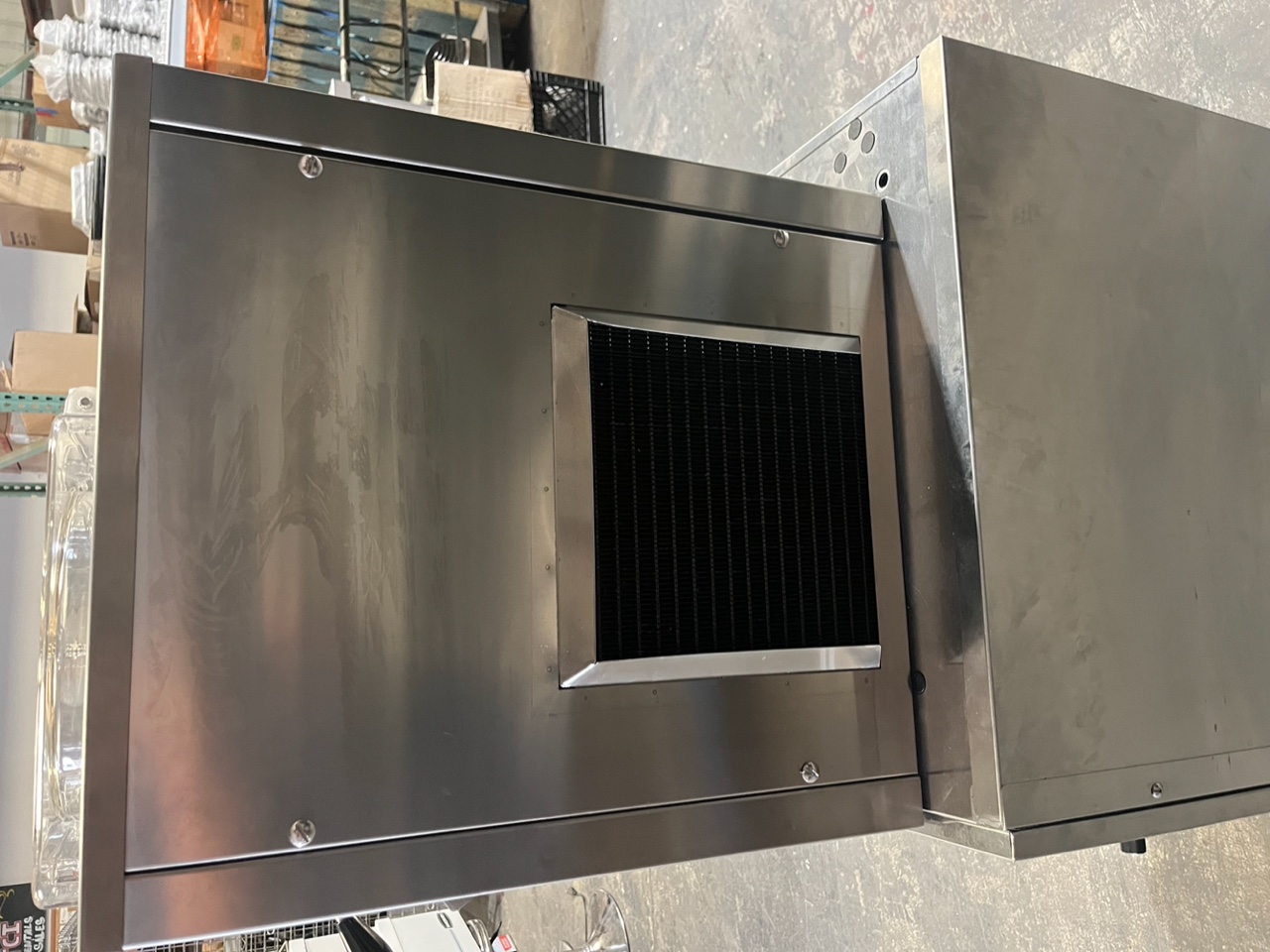 Rear view of Stoelting VB9-37a batch freezer showing stainless steel housing and air-cooled condenser vent