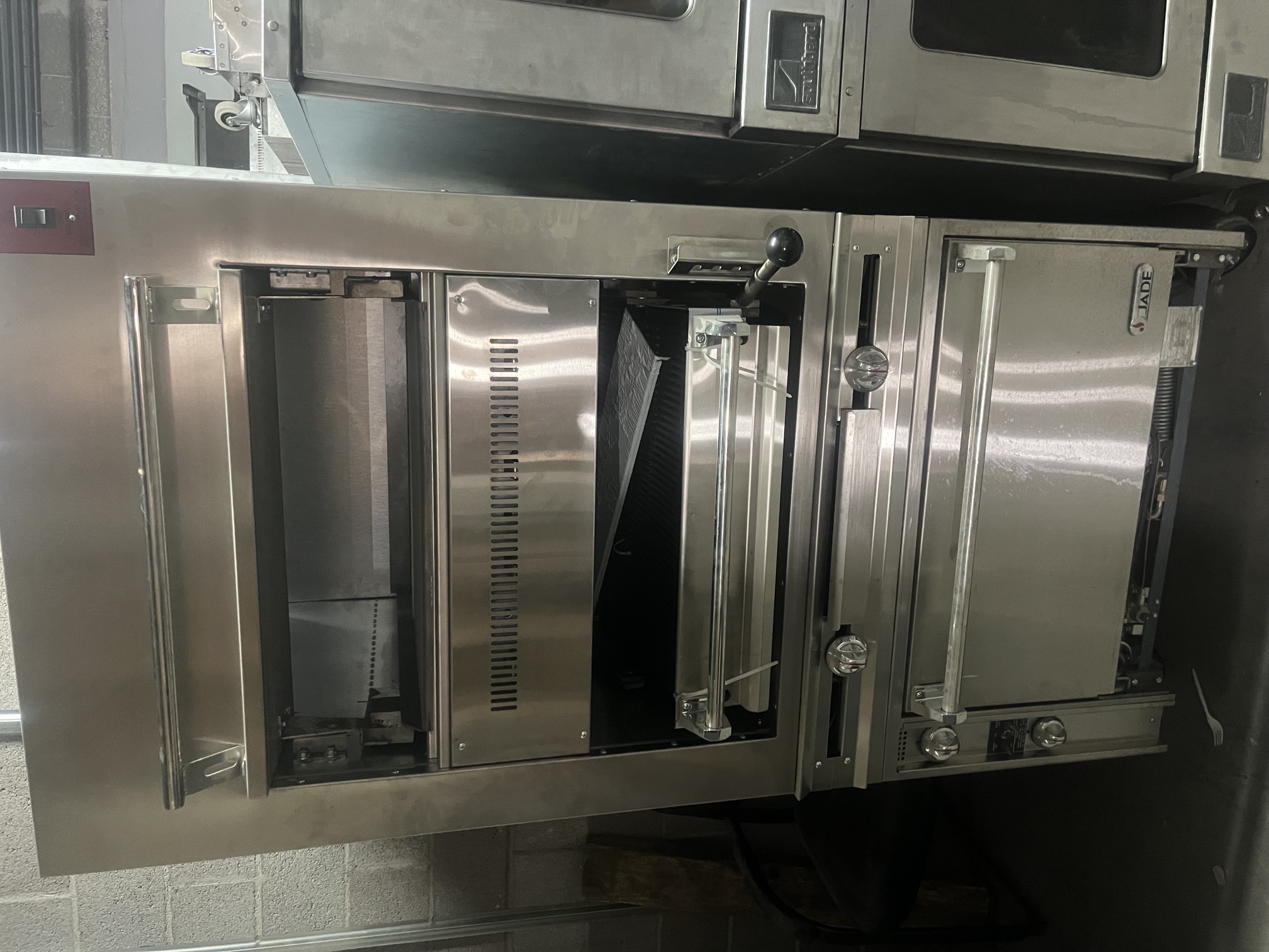 Front view of Jade Range JSHBI-36H-36C gas deck broiler showing upper salamander section, middle broiler deck with adjustable grates, and lower oven compartment with door closed