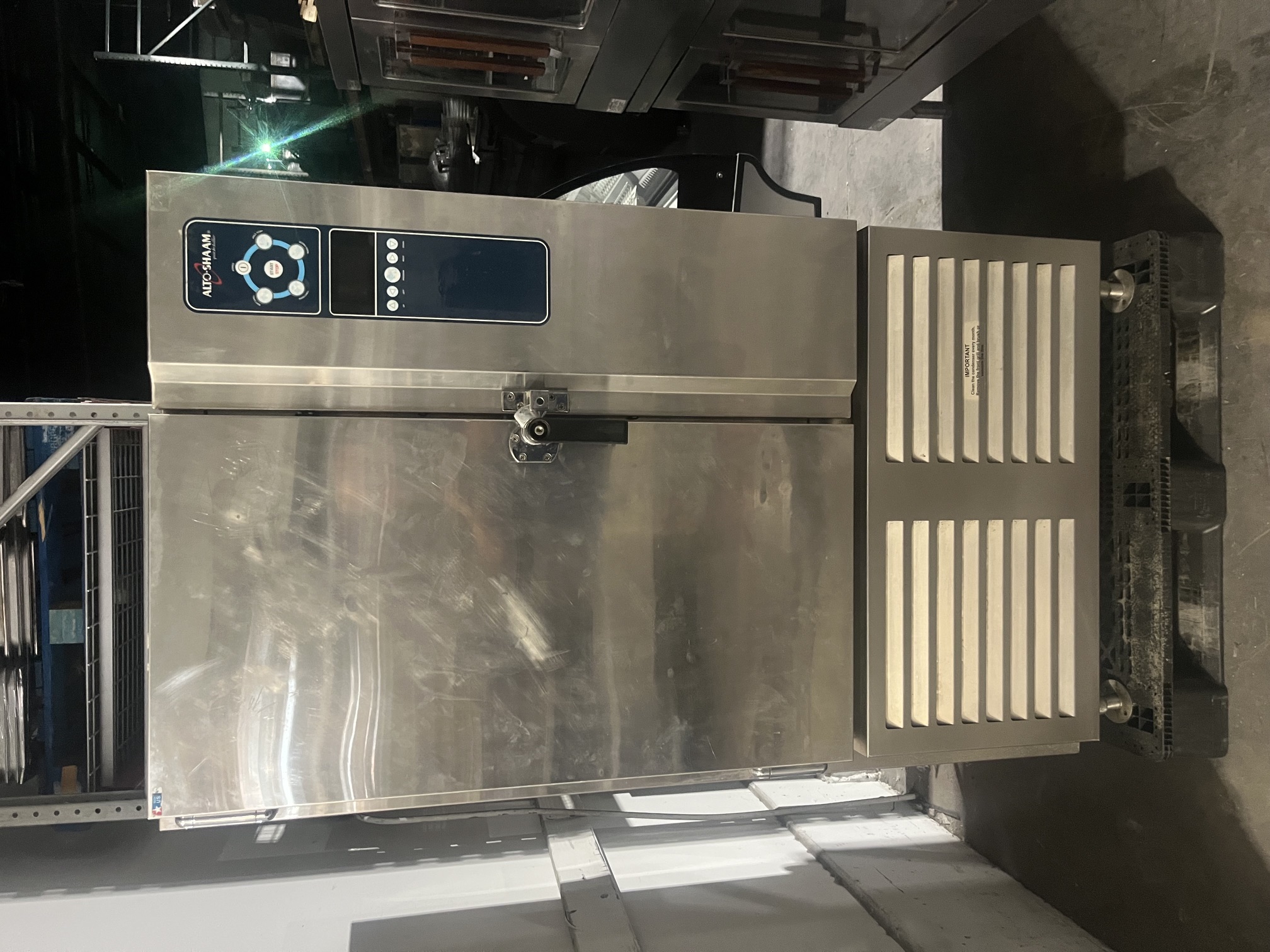 Front view of Alto-Shaam QC40B blast chiller/shock freezer with door closed showing digital control panel and bottom compressor compartment