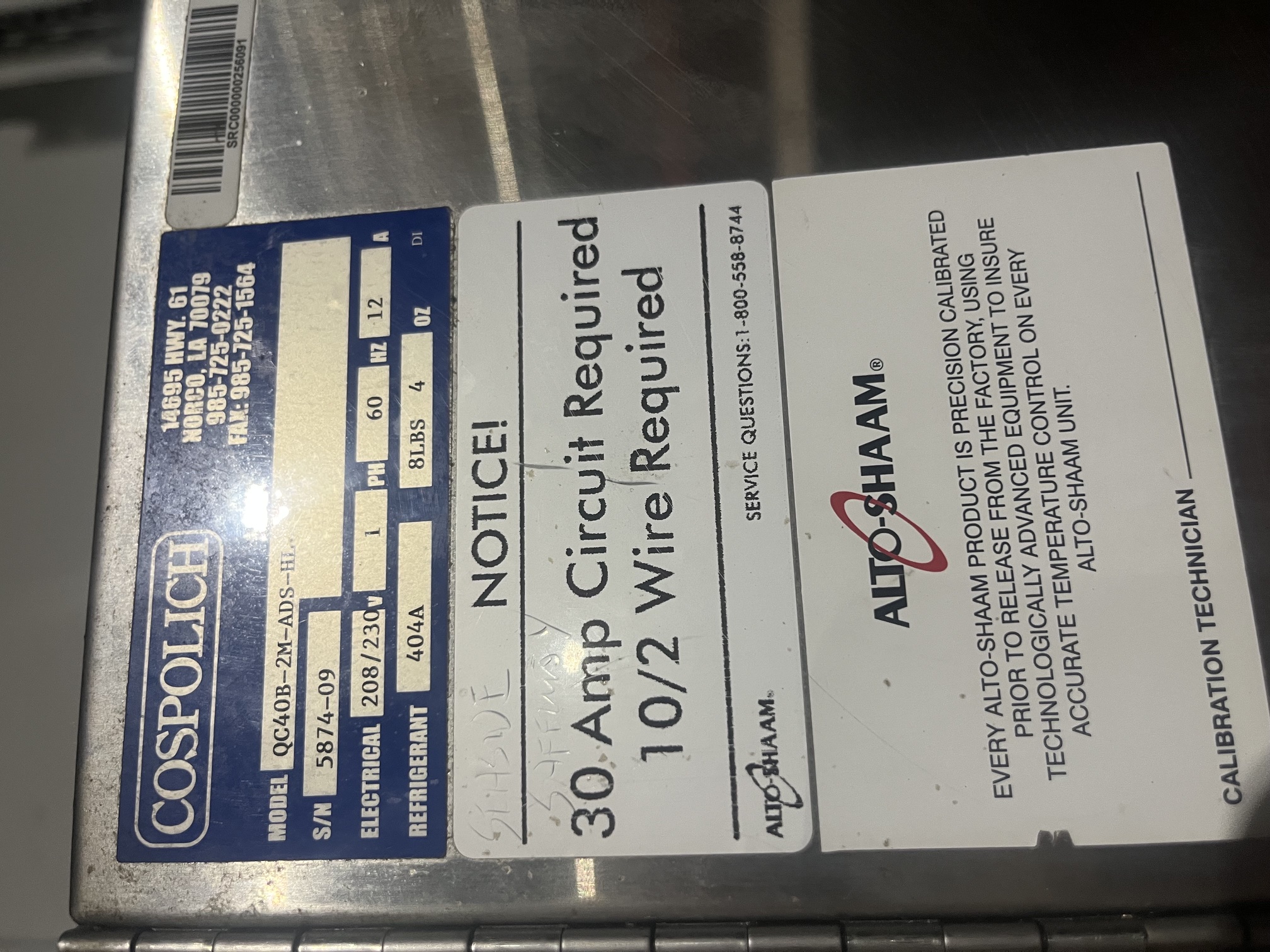 Data plate showing Alto-Shaam QC40B-2M-ADS-HL model number, serial number 5874-09, 208/230V electrical specifications, and 30 amp circuit requirement