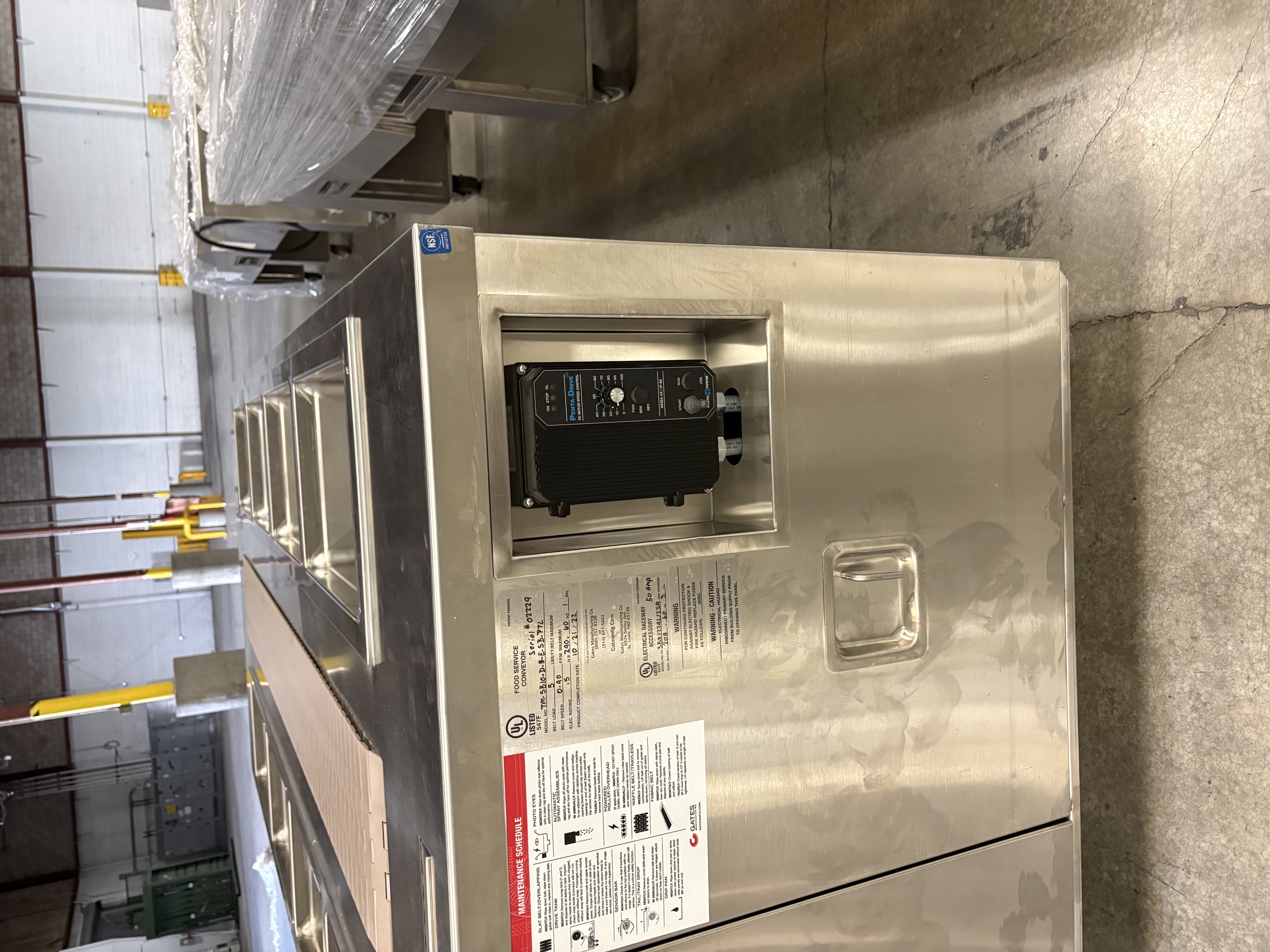 End panel view showing UL data plate with model TM-SB10-D-8-E-SB-PTL, serial number, electrical specs, and Penta-Drive speed controller