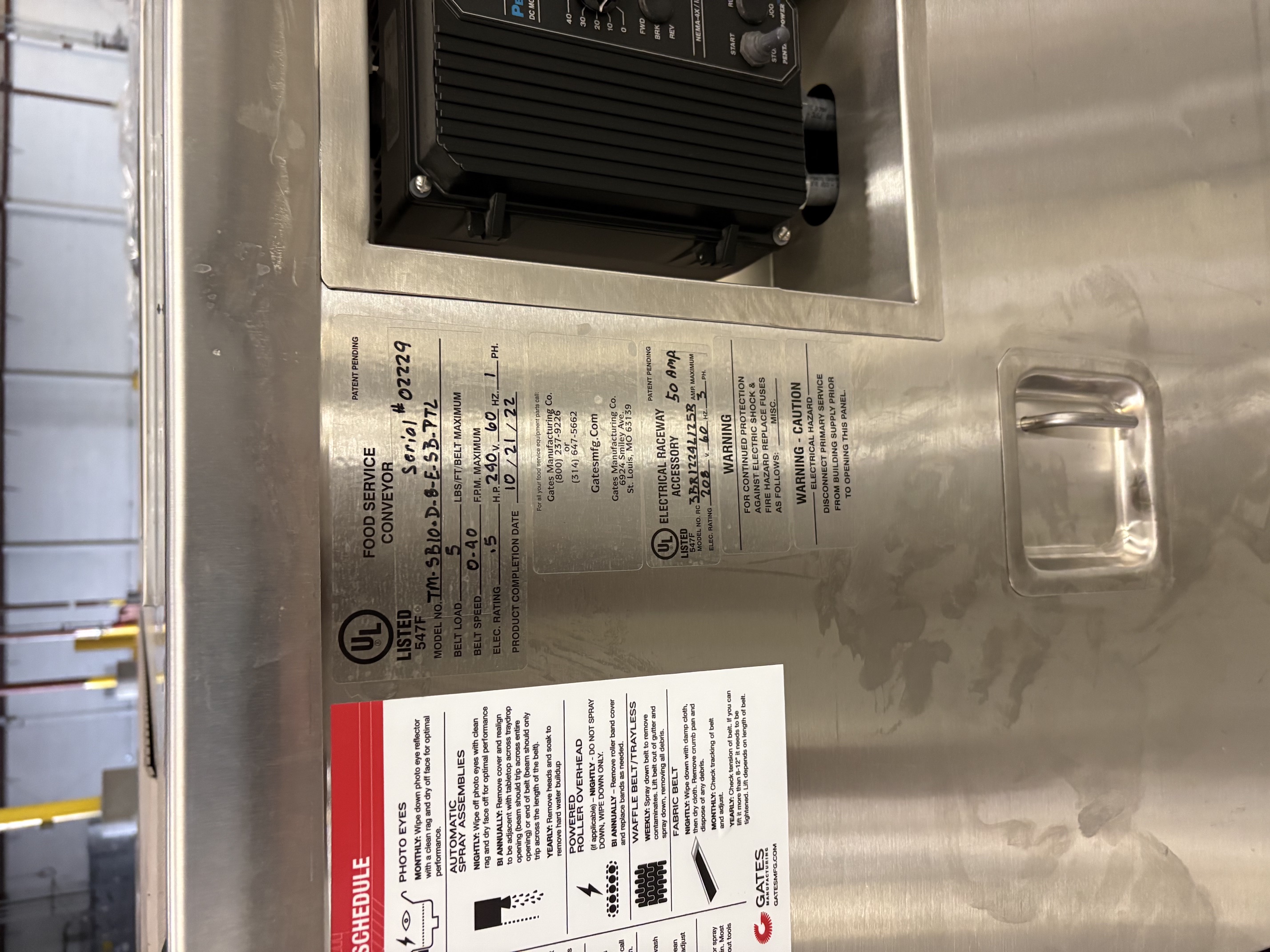 Detailed view of UL data plate showing model number, belt load specs, electrical ratings, and Gates Manufacturing information