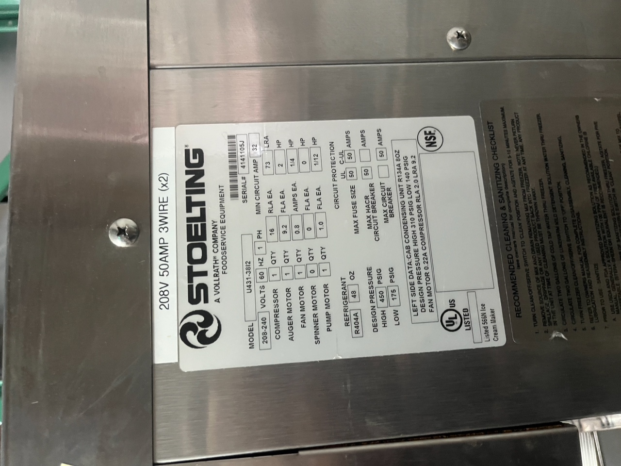 Close-up of Stoelting U431-38I2 data plate showing model number, serial number 4141105J, electrical specifications, and refrigerant details