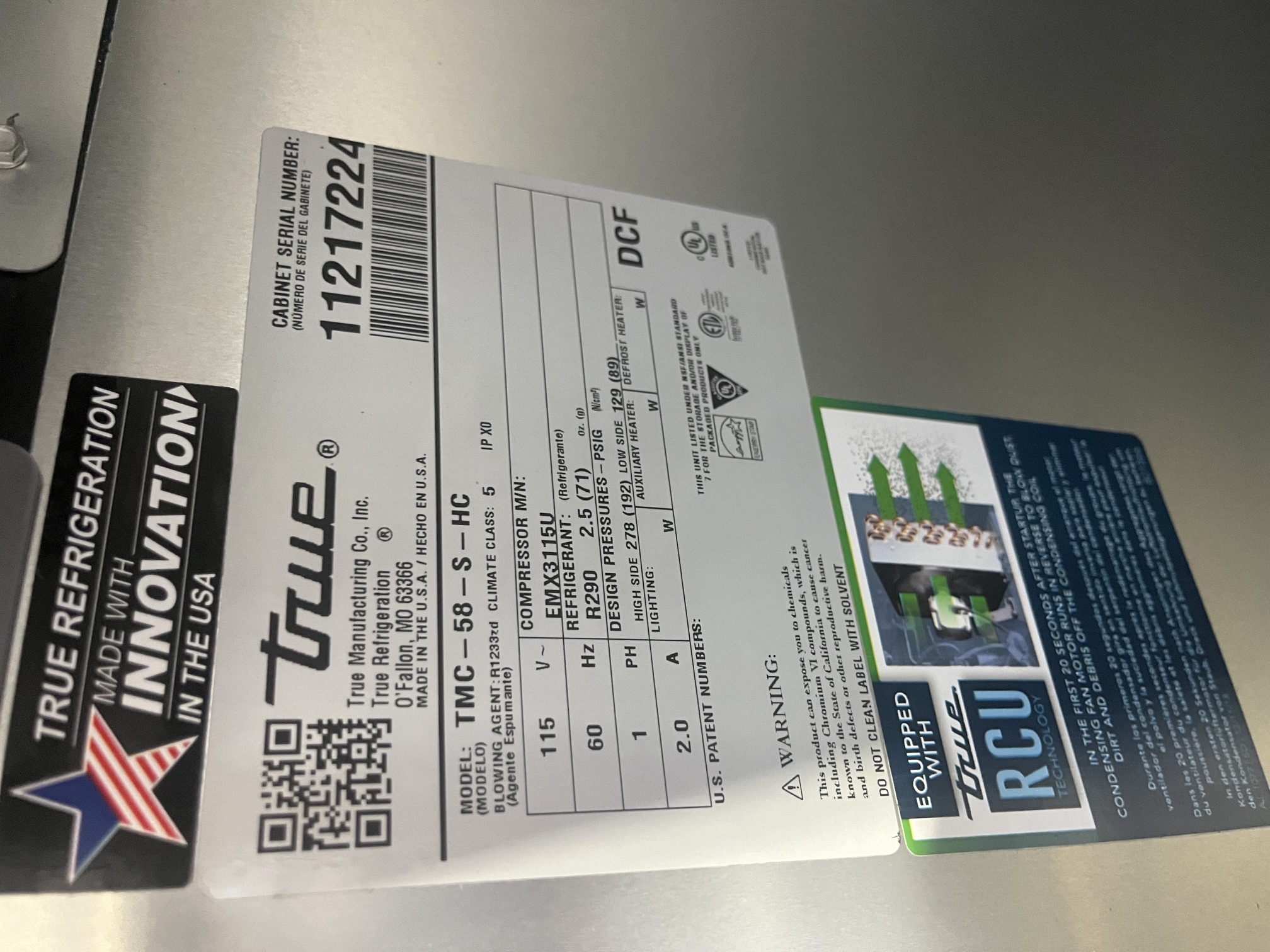 True TMC-58-S-HC data plate showing model number, serial number 11217224, 115V/60Hz/1Ph electrical specs, R-290 refrigerant, and RCU technology badge